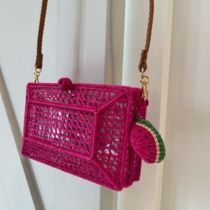 Serpui wowen crossbody bag fuchsia pink with a watermelon chain